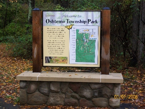A sign that says Welcome to Oshtemo Township Park